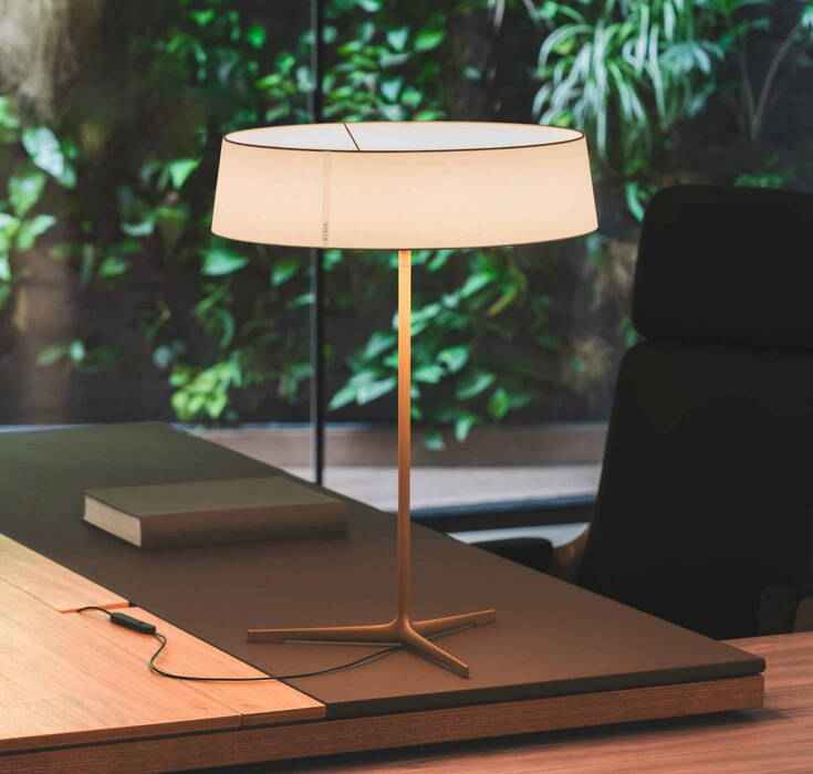 Vibia Dama table lamp with soft ambiental lighting